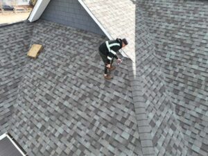 worker working on roof